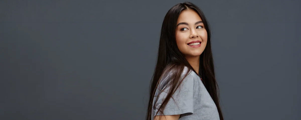 Filipina wife with warm, approachable expression in casual attire