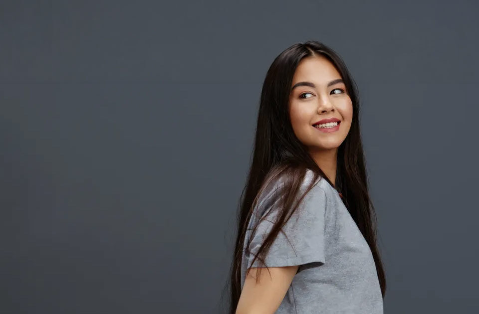 Filipina wife with warm, approachable expression in casual attire