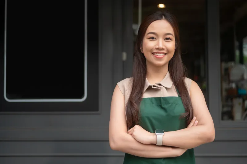 Smiling Filipina in professional setting, embodying the confidence and clarity needed to marry a Filipina successfully