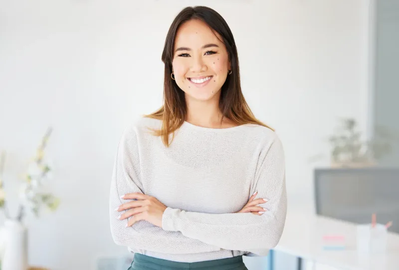 Confident woman in professional portrait, representing preparation for family engagement ceremonies