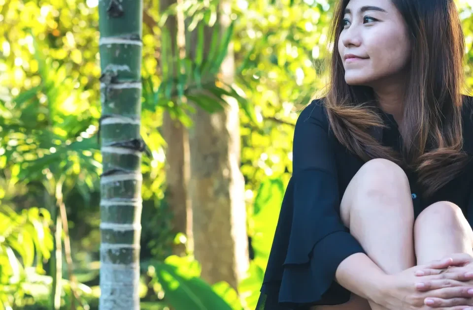 Woman with confident, warm smile expressing genuine emotion and connection