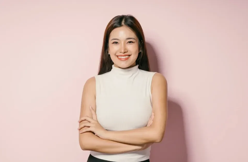 Woman with confident smile wearing professional attire