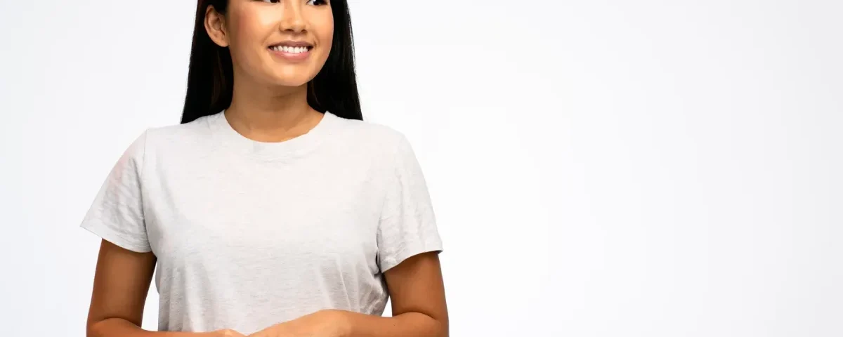 Confident woman with a warm, thoughtful expression in natural light