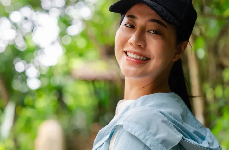 Woman smiling confidently in professional portrait setting