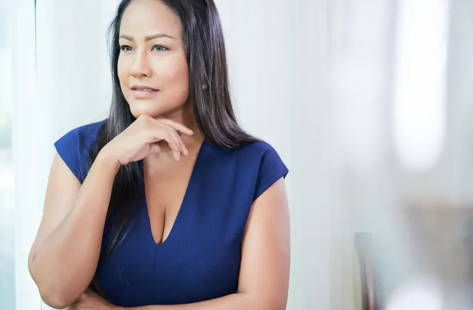 Woman in thoughtful pose considering relationship commitment and clarity