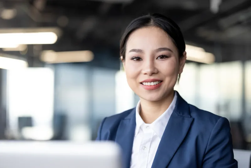 Professional confident woman in business attire, symbolizing the thoughtful preparation and respect required when meeting a Filipina partner's family.